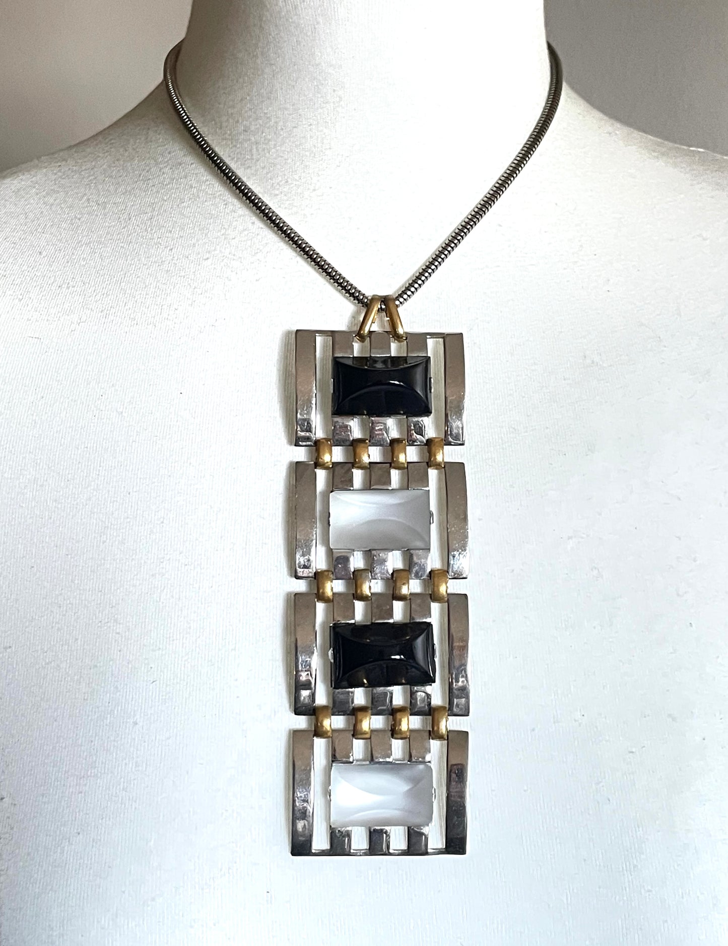 Huge vintage true Art Deco articulated long pendant necklace, silver and gold tone, monochrome black and white moulded glass and snake chain
