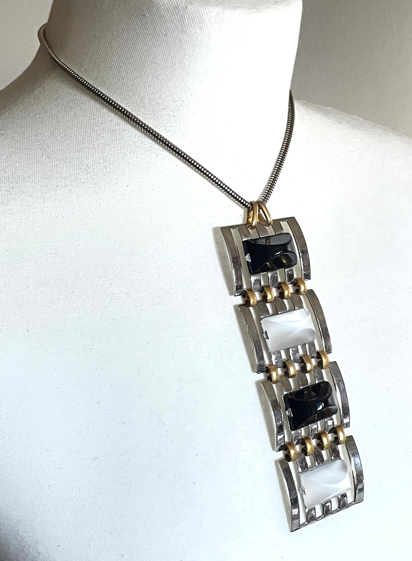 Huge vintage true Art Deco articulated long pendant necklace, silver and gold tone, monochrome black and white moulded glass and snake chain