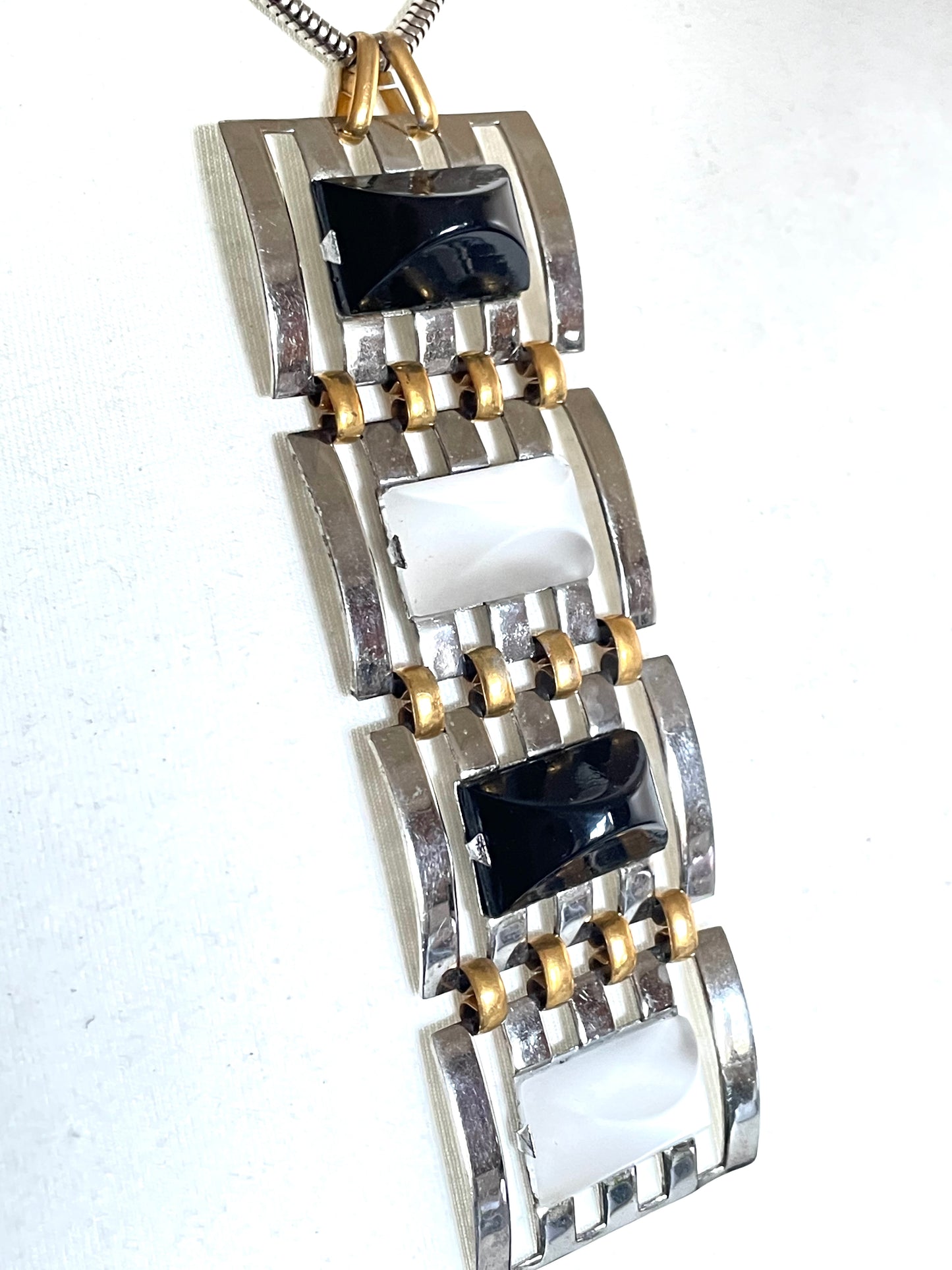 Huge vintage true Art Deco articulated long pendant necklace, silver and gold tone, monochrome black and white moulded glass and snake chain