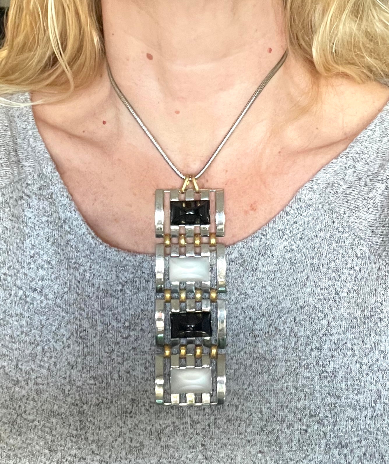 Huge vintage true Art Deco articulated long pendant necklace, silver and gold tone, monochrome black and white moulded glass and snake chain
