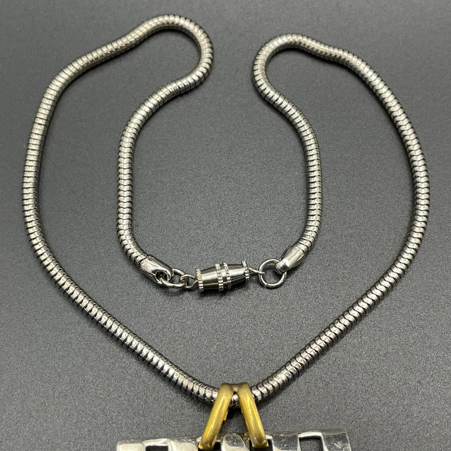 Huge vintage true Art Deco articulated long pendant necklace, silver and gold tone, monochrome black and white moulded glass and snake chain