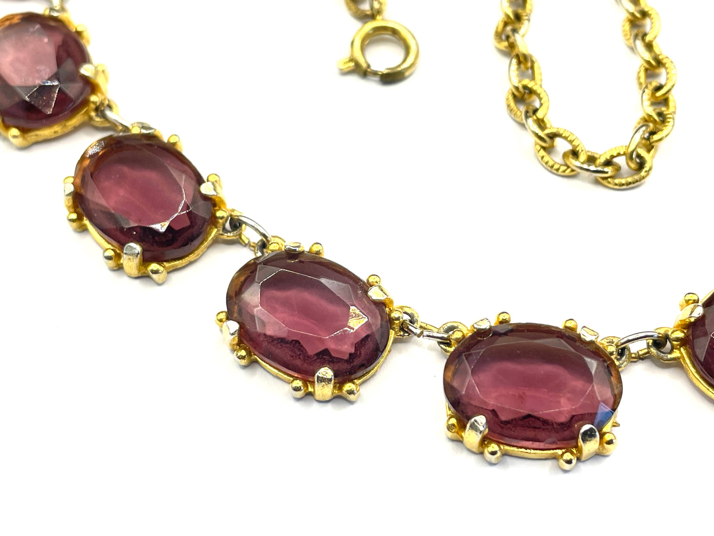 Vintage Sphinx amethyst purple / violet glass riviere necklace, heavy, bezel set, open-backed stones in ornate gold tone setting