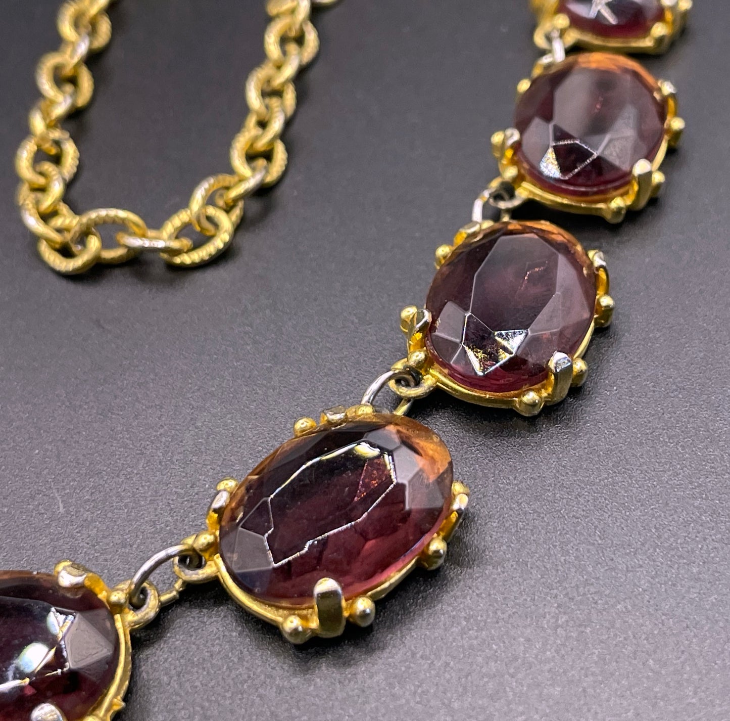 Vintage Sphinx amethyst purple / violet glass riviere necklace, heavy, bezel set, open-backed stones in ornate gold tone setting