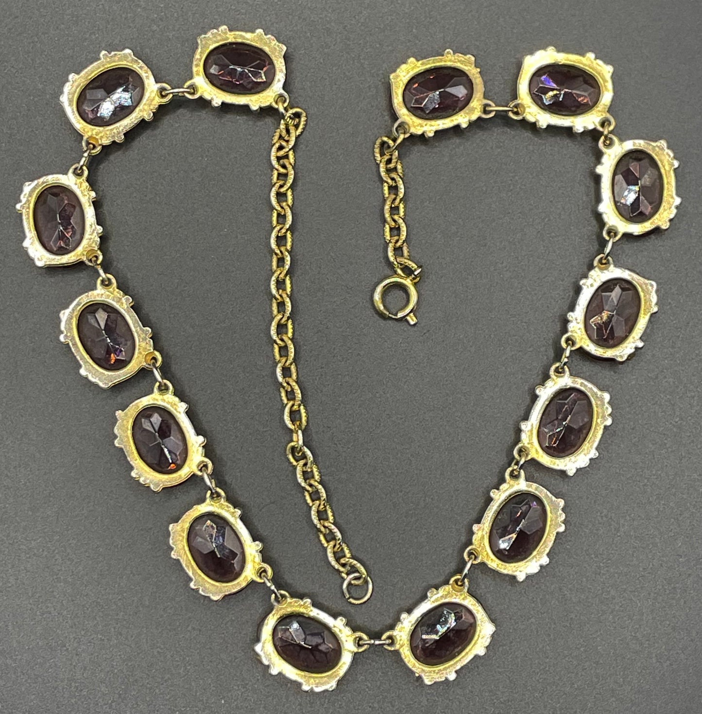 Vintage Sphinx amethyst purple / violet glass riviere necklace, heavy, bezel set, open-backed stones in ornate gold tone setting
