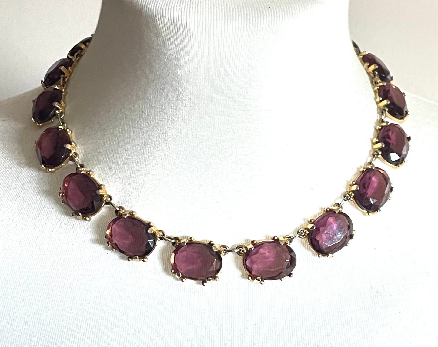 Vintage Sphinx amethyst purple / violet glass riviere necklace, heavy, bezel set, open-backed stones in ornate gold tone setting