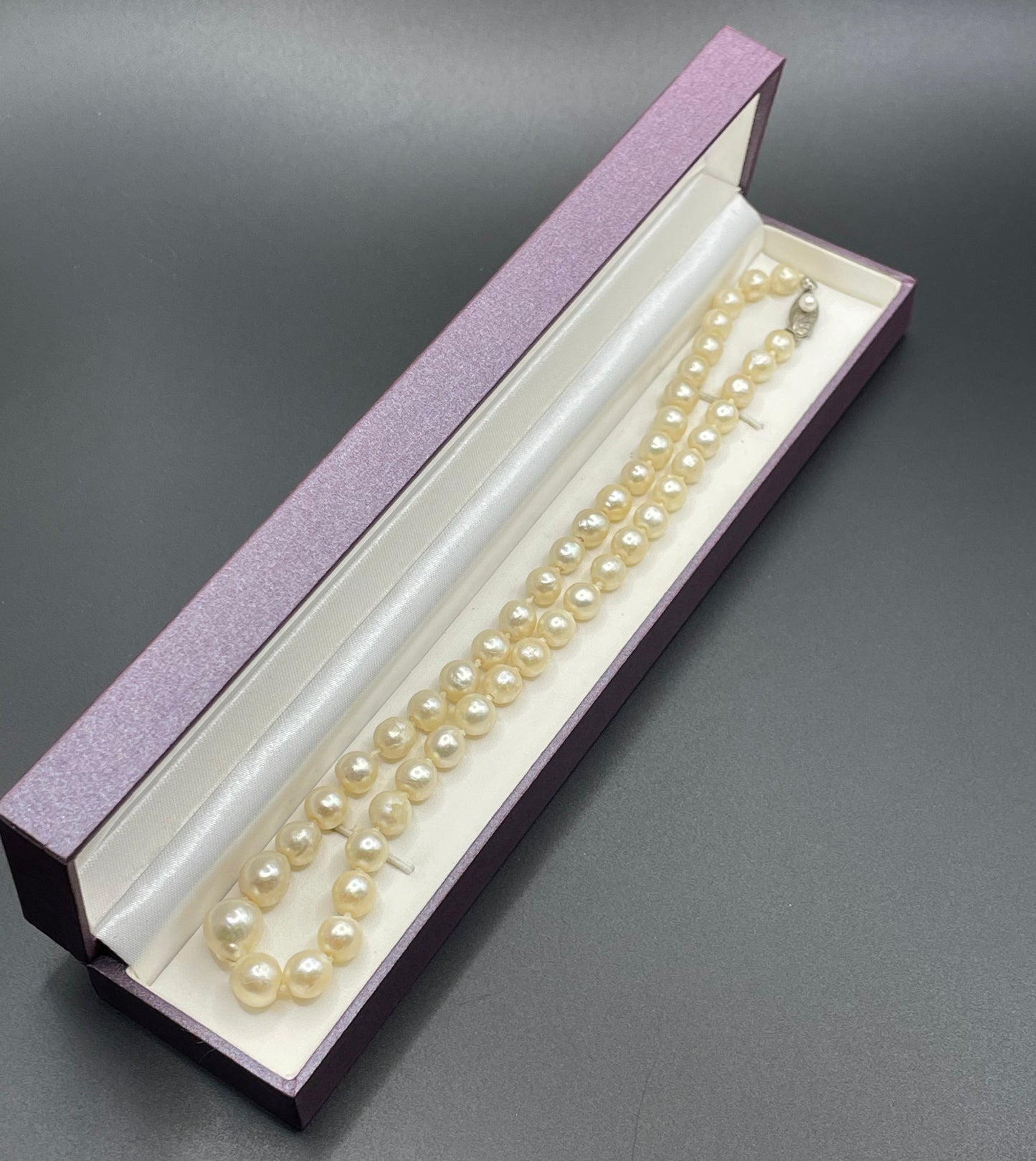 Antique real cultured baroque pearl necklace, large and graduated in size, hand-knotted, in presentation box, pretty sterling silver clasp 30 grams