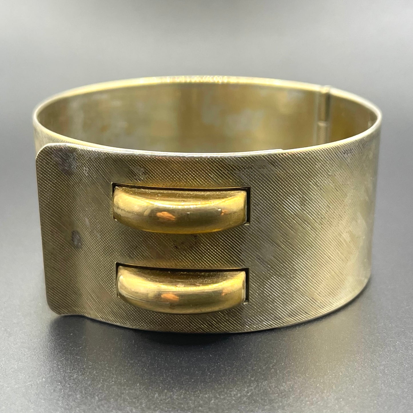 Vintage Art Deco engine turned machine age gold tone gilded on silver tone wide bangle bracelet hinged cuff, abstract Bauhaus design