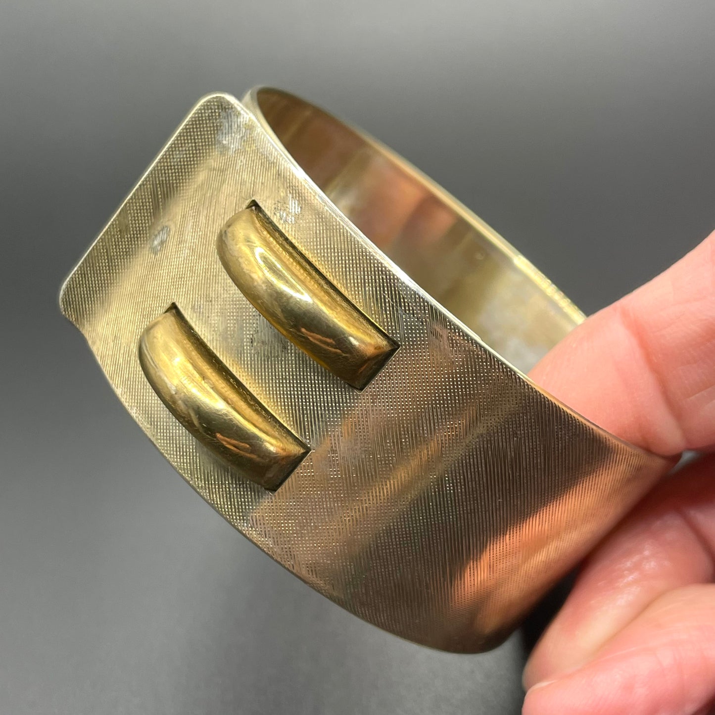 Vintage Art Deco engine turned machine age gold tone gilded on silver tone wide bangle bracelet hinged cuff, abstract Bauhaus design