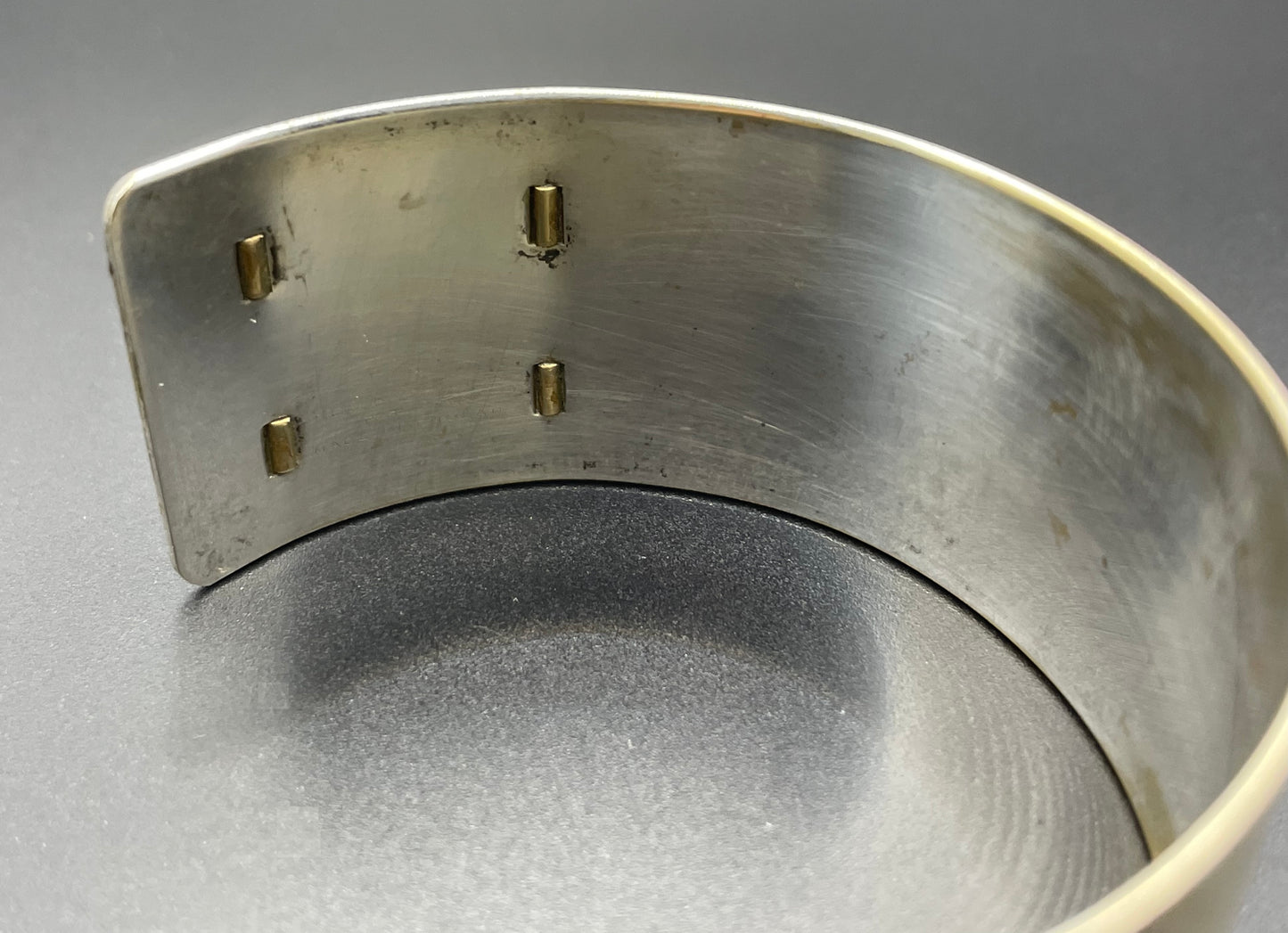 Vintage Art Deco engine turned machine age gold tone gilded on silver tone wide bangle bracelet hinged cuff, abstract Bauhaus design