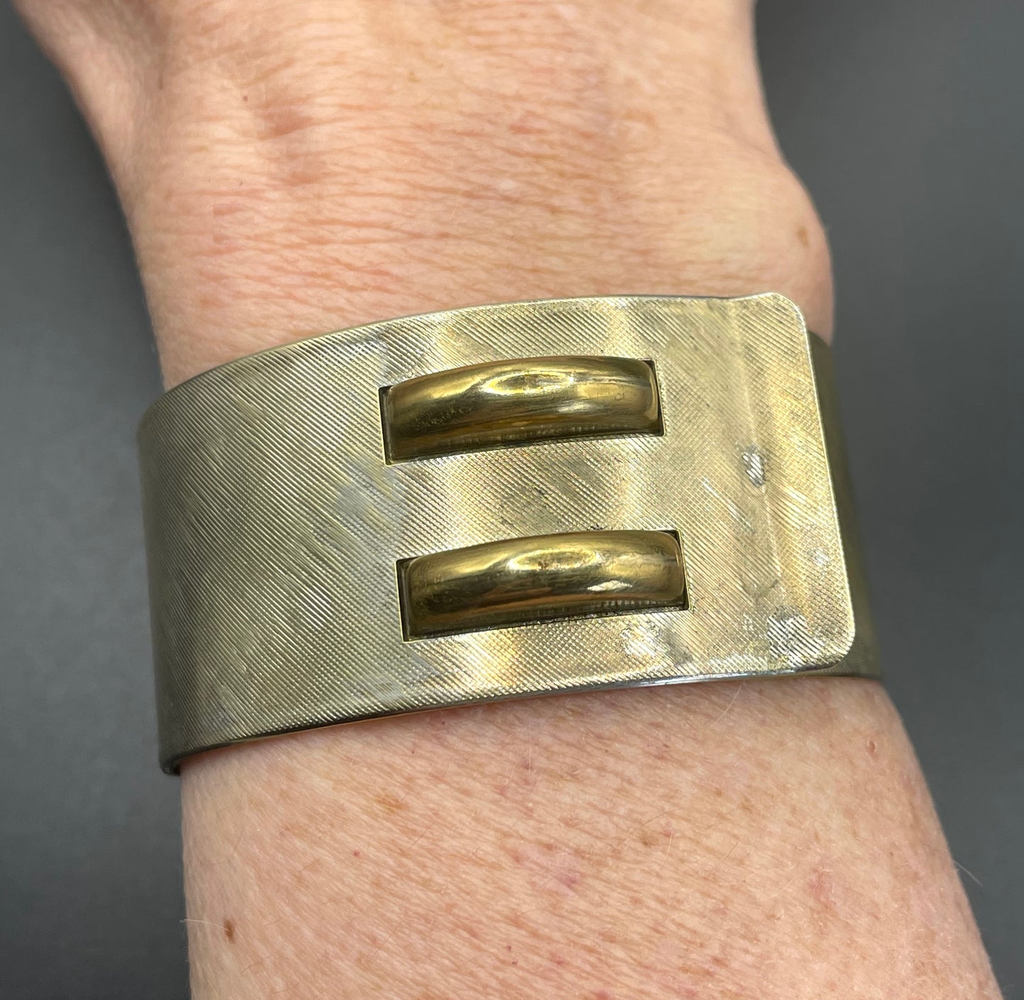 Vintage Art Deco engine turned machine age gold tone gilded on silver tone wide bangle bracelet hinged cuff, abstract Bauhaus design
