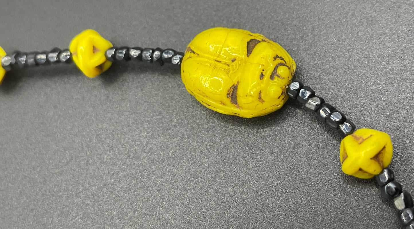 Vintage Art Deco Neiger Egyptian revival scarab glass bead necklace, vibrant bright yellow Czech beads and black spacer beads