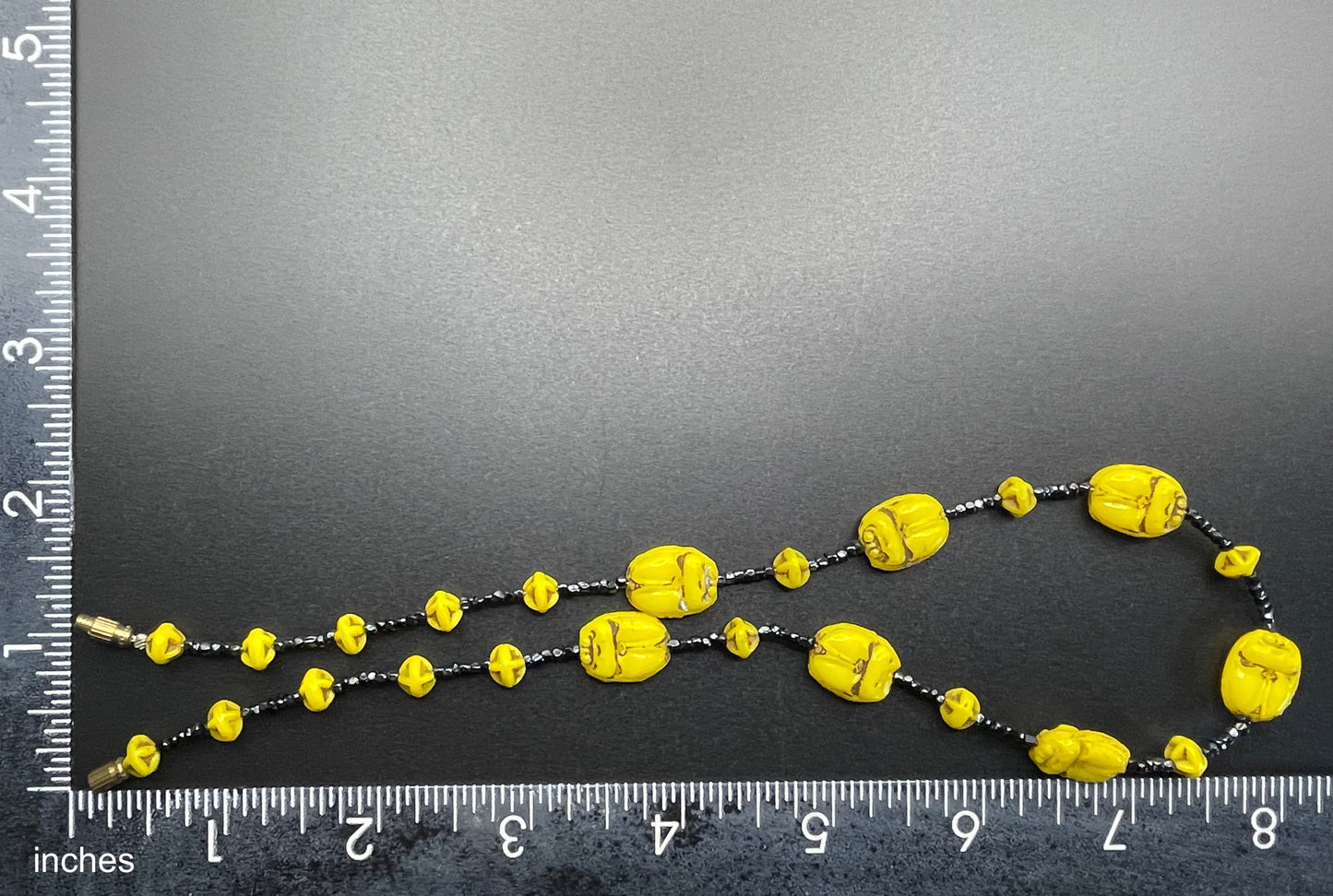 Vintage Art Deco Neiger Egyptian revival scarab glass bead necklace, vibrant bright yellow Czech beads and black spacer beads
