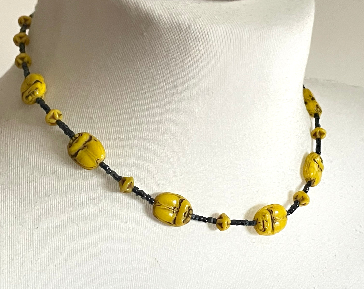 Vintage Art Deco Neiger Egyptian revival scarab glass bead necklace, vibrant bright yellow Czech beads and black spacer beads