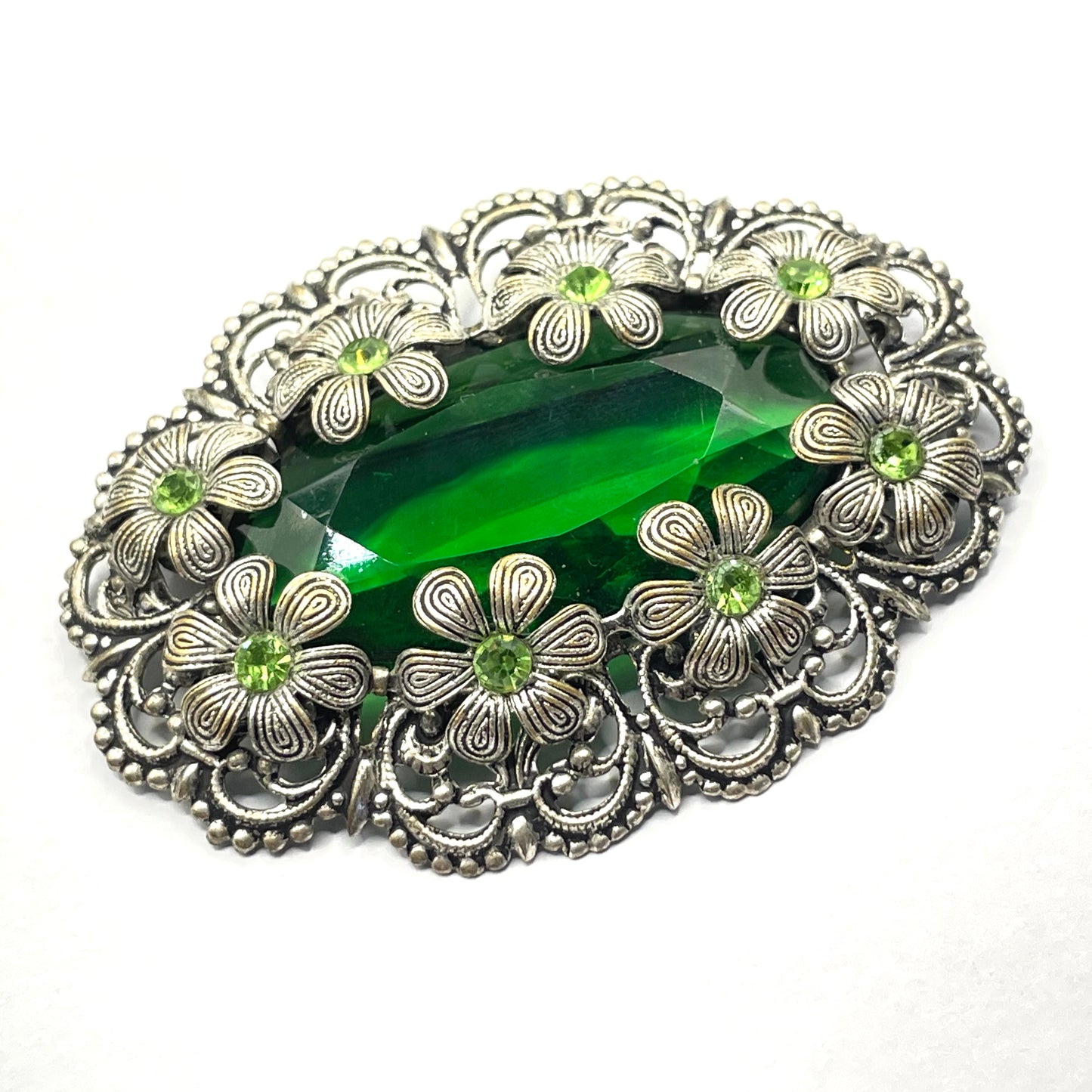 Vintage Art Deco 1930s Czech light & dark green rhinestone brooch with antique silver tone floral filigree - large open backed green crystal