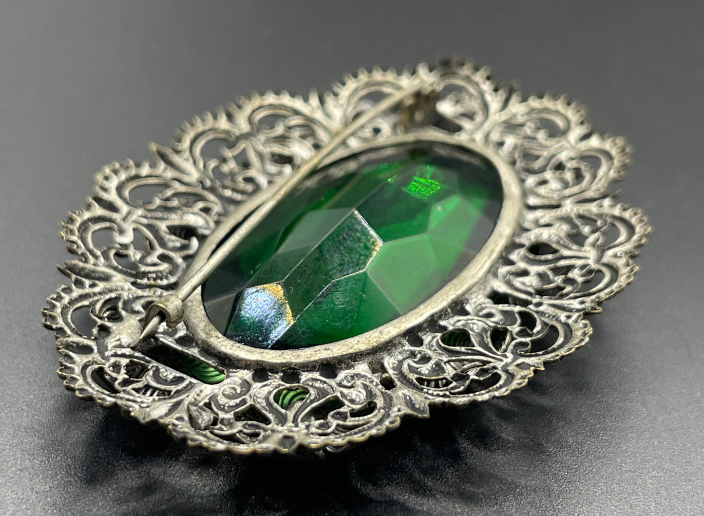 Vintage Art Deco 1930s Czech light & dark green rhinestone brooch with antique silver tone floral filigree - large open backed green crystal