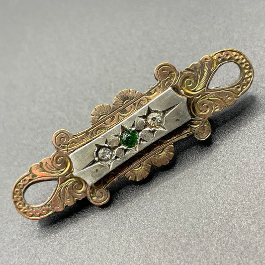 Adorable small antique Victorian gold tone (probably rolled gold) and silver fronted brooch, with clear and green (untested) stones, stamped