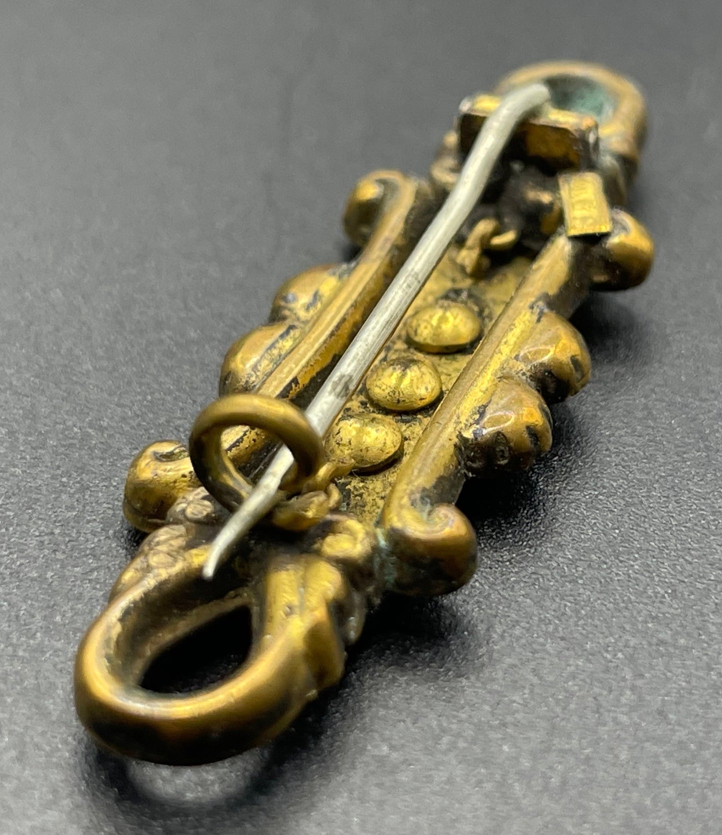 Adorable small antique Victorian gold tone (probably rolled gold) and silver fronted brooch, with clear and green (untested) stones, stamped
