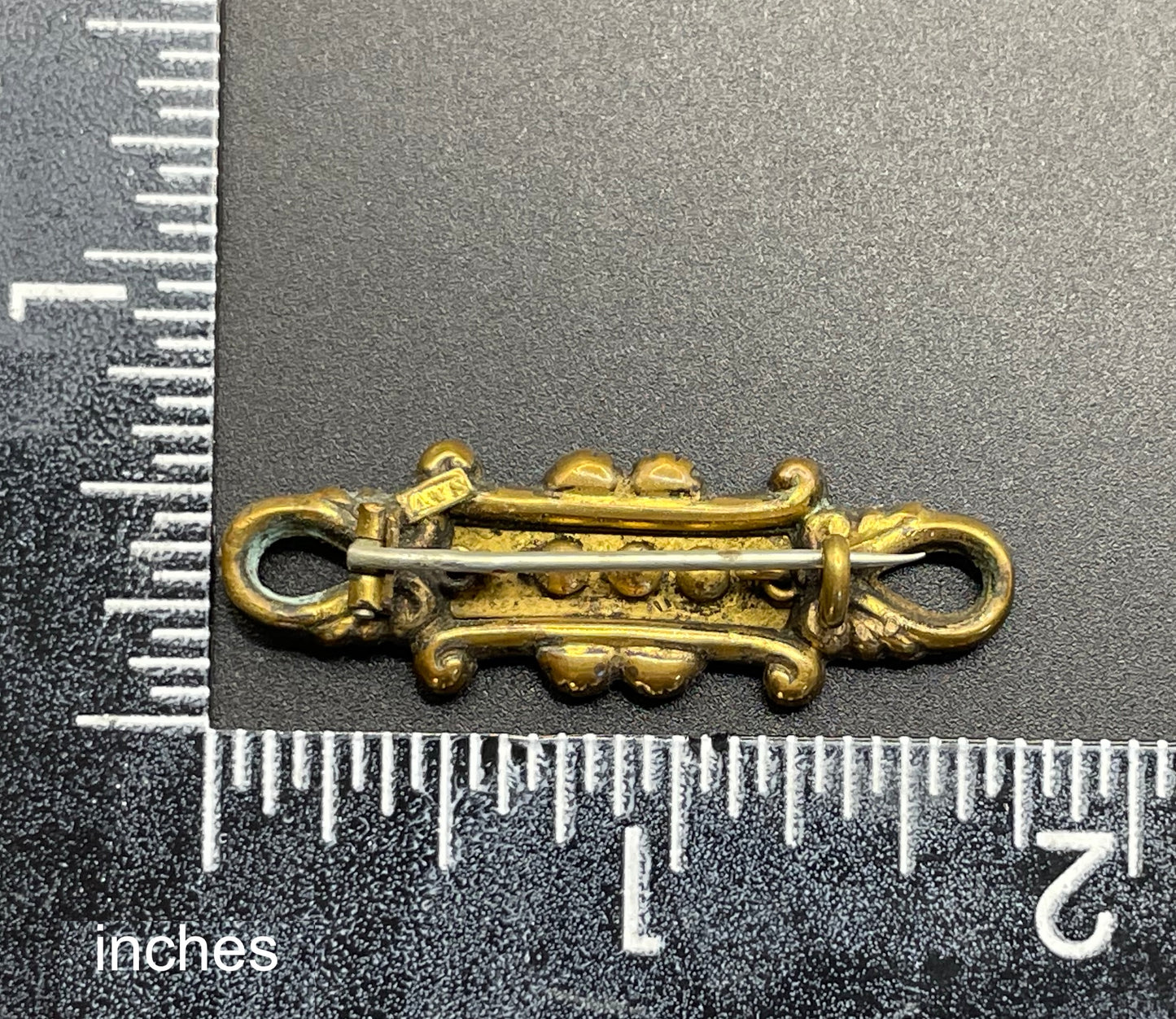 Adorable small antique Victorian gold tone (probably rolled gold) and silver fronted brooch, with clear and green (untested) stones, stamped
