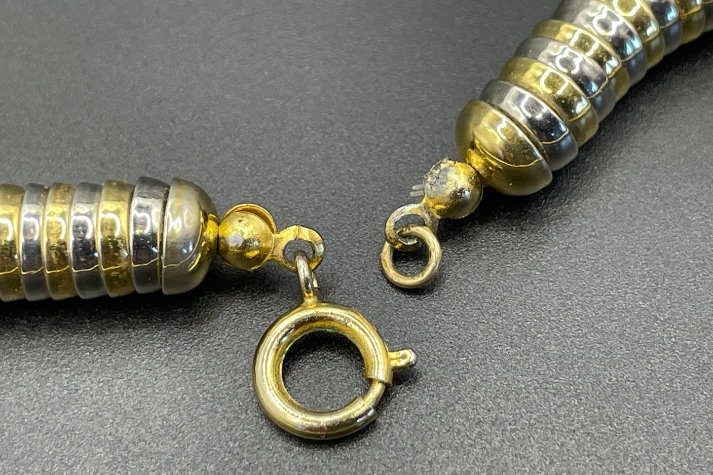 Vintage Jakob Bengel style Art Deco machine age gold and silver tone stacked cup bead geometric choker necklace