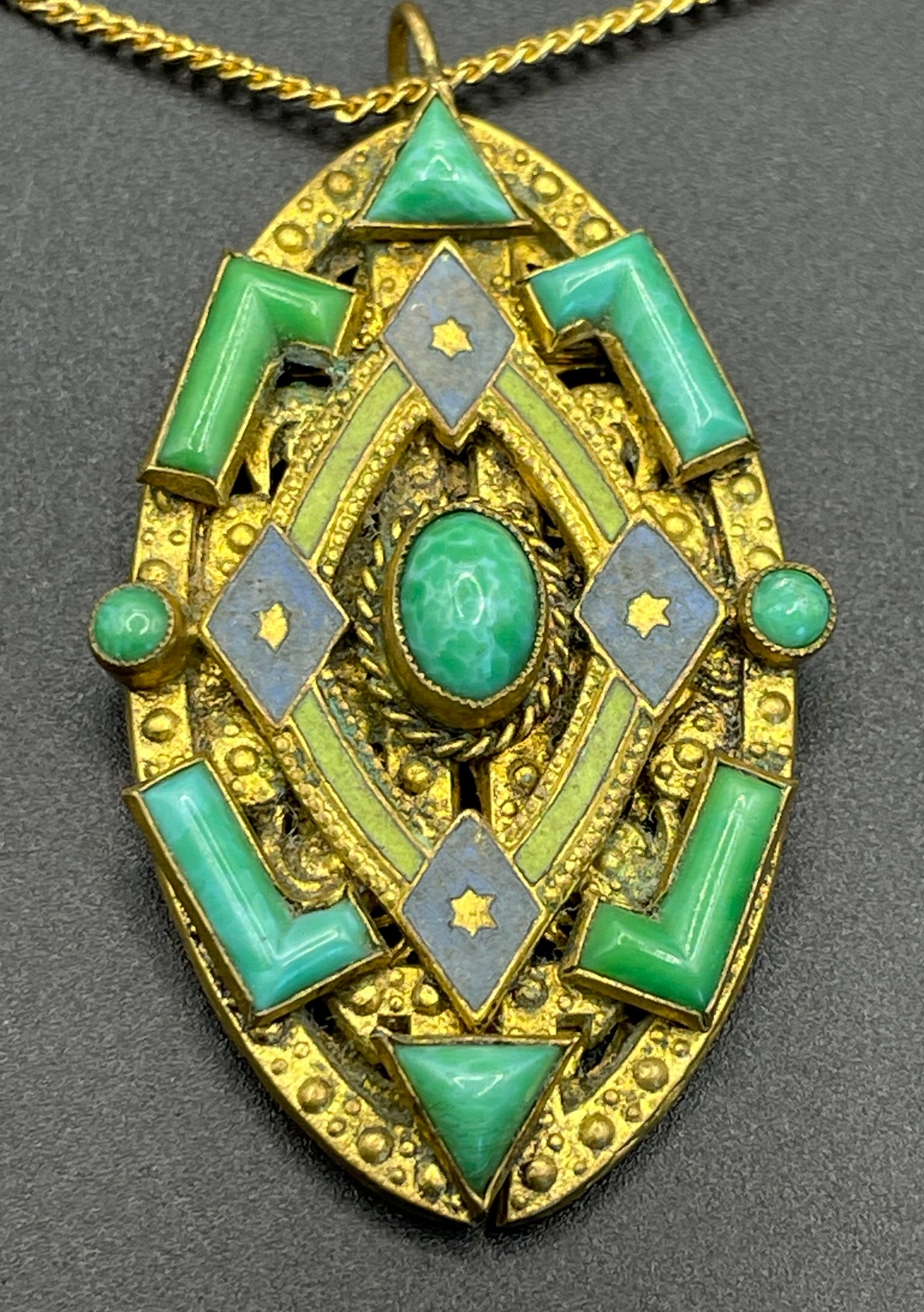 Vintage Neiger pendant with moulded green glass geometric shapes, enamel and 'Peking' style glass cabochons in gold tone filigree