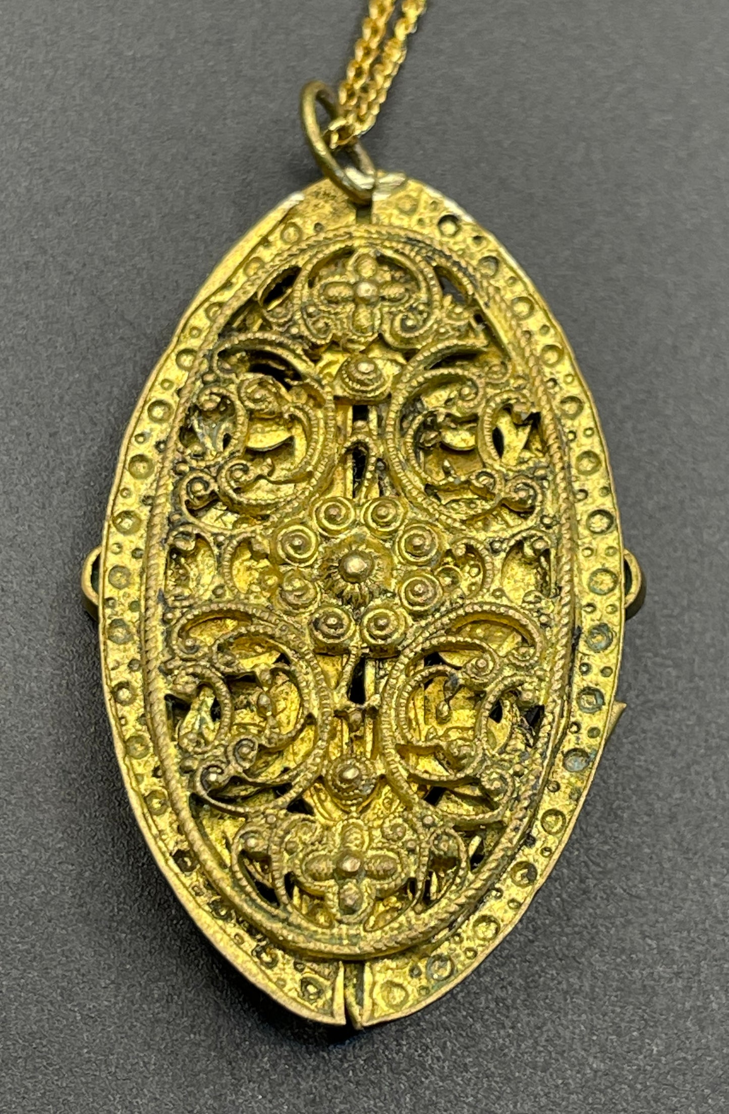 Vintage Neiger pendant with moulded green glass geometric shapes, enamel and 'Peking' style glass cabochons in gold tone filigree