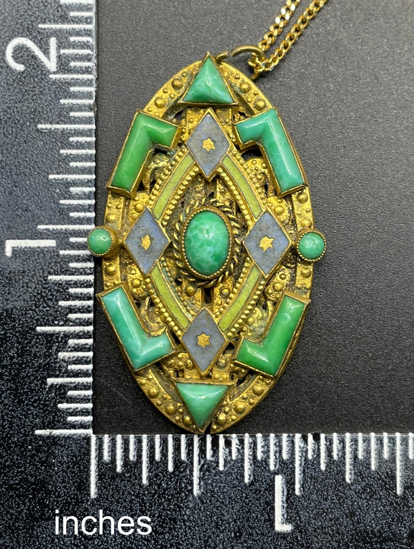 Vintage Neiger pendant with moulded green glass geometric shapes, enamel and 'Peking' style glass cabochons in gold tone filigree
