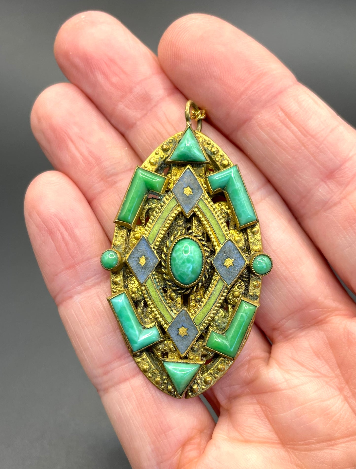 Vintage Neiger pendant with moulded green glass geometric shapes, enamel and 'Peking' style glass cabochons in gold tone filigree
