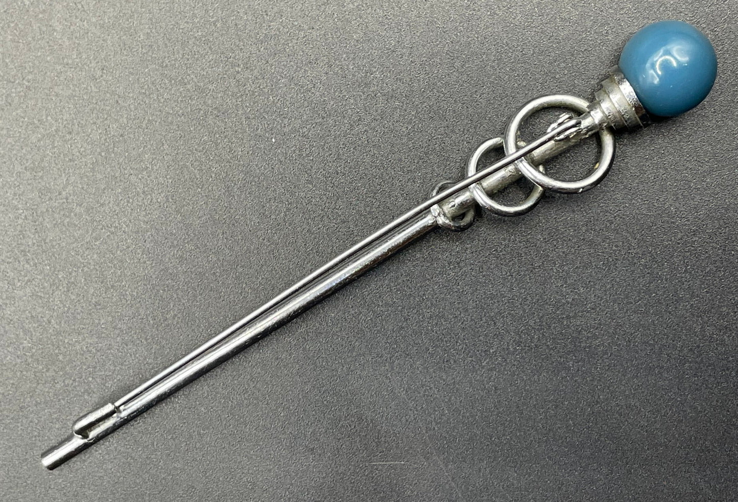Vintage Jakob Bengel Art Deco machine age, beautiful blue (almost teal) galalith ball and chrome silver tone abstract long brooch