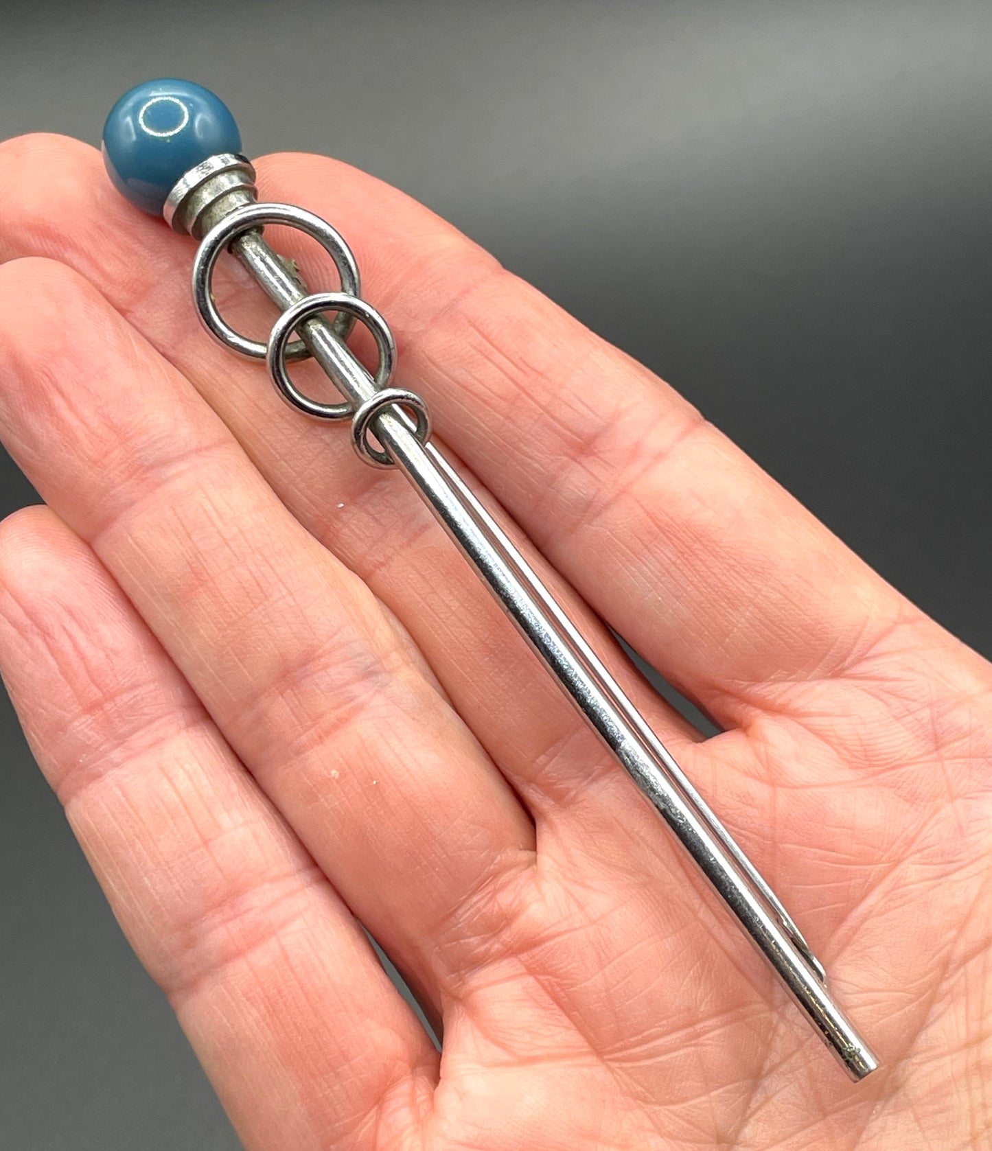 Vintage Jakob Bengel Art Deco machine age, beautiful blue (almost teal) galalith ball and chrome silver tone abstract long brooch