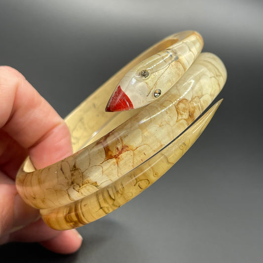 Vintage Art Deco 1920s to 1930s reverse painted, clear celluloid spiral snake bangle bracelet, clear rhinestone eyes