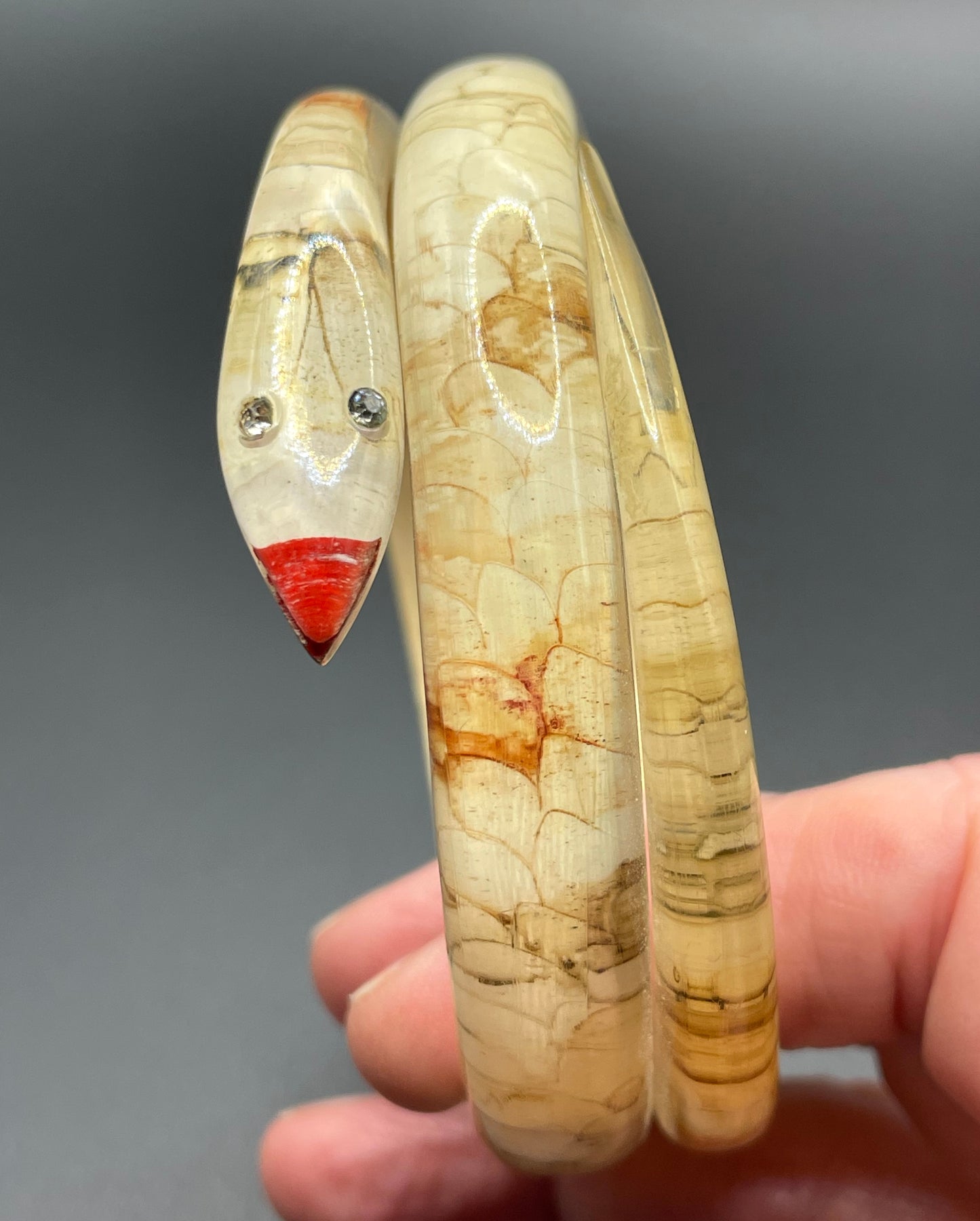 Vintage Art Deco 1920s to 1930s reverse painted, clear celluloid spiral snake bangle bracelet, clear rhinestone eyes