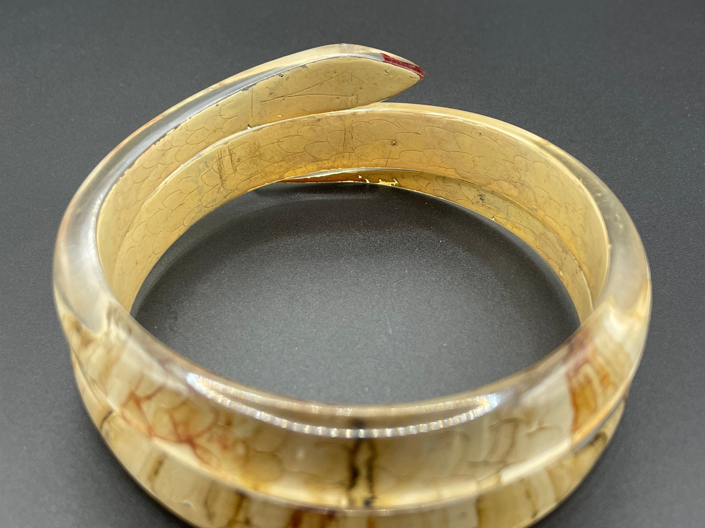 Vintage Art Deco 1920s to 1930s reverse painted, clear celluloid spiral snake bangle bracelet, clear rhinestone eyes