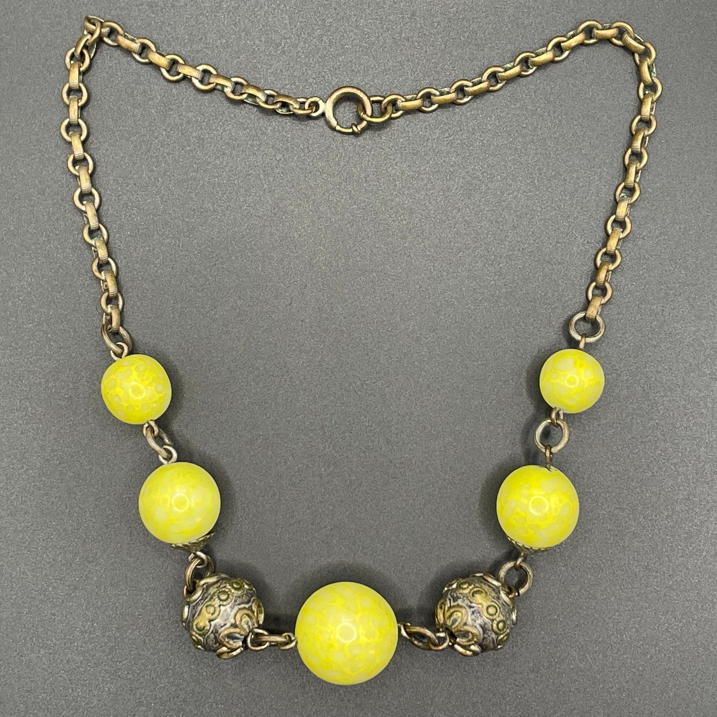 Vintage uranium glass Art Deco necklace - bright yellow marbled uranium glass UV sensitive beads, brass chain and beads