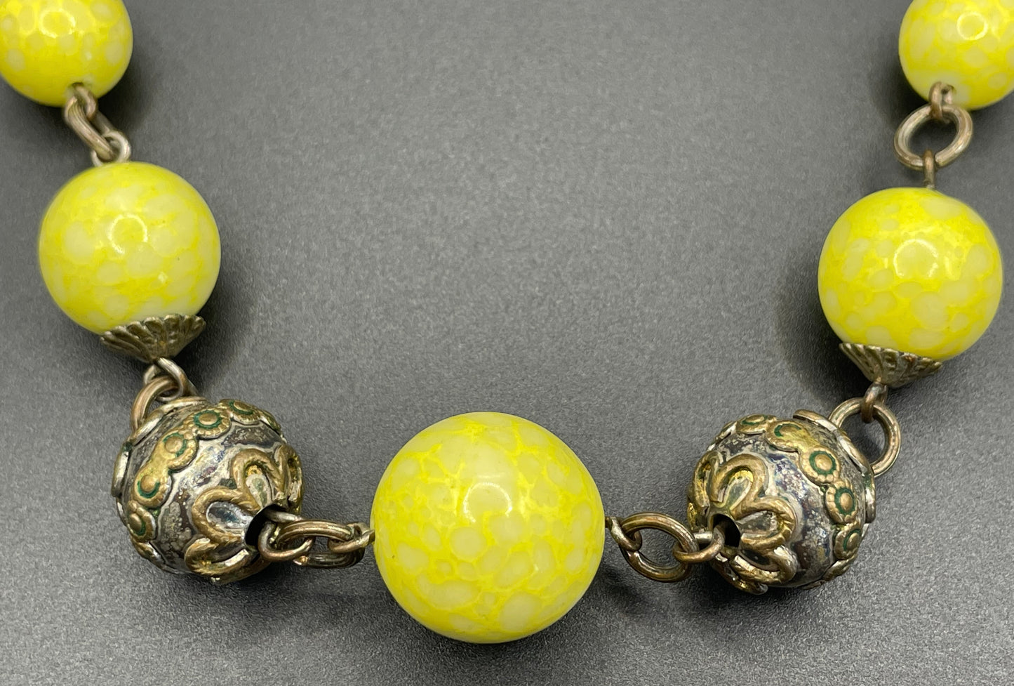 Vintage uranium glass Art Deco necklace - bright yellow marbled uranium glass UV sensitive beads, brass chain and beads