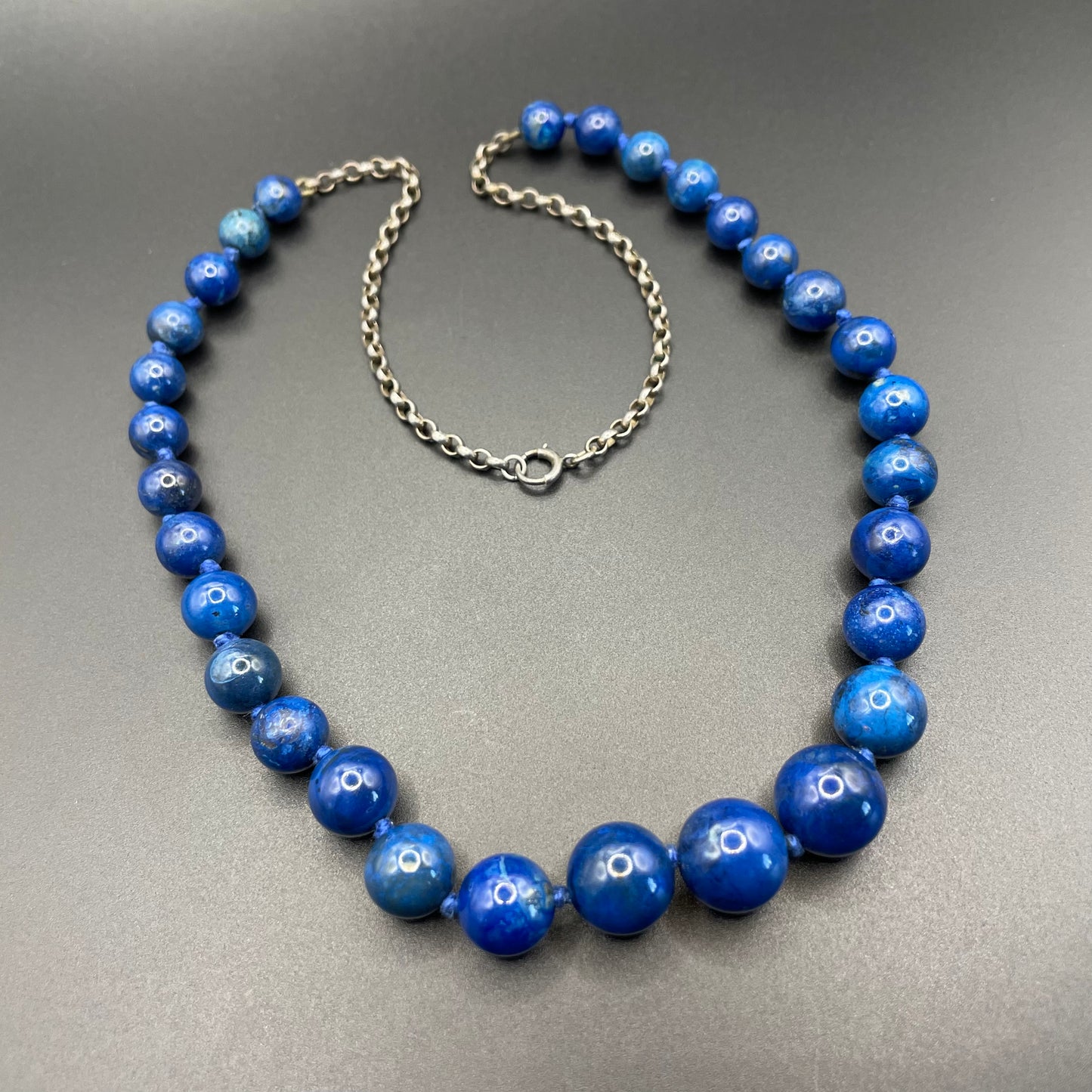 Vintage / antique lapis lazuli blue bead gemstone necklace with unmarked sterling silver belcher chain sections, 48 grams