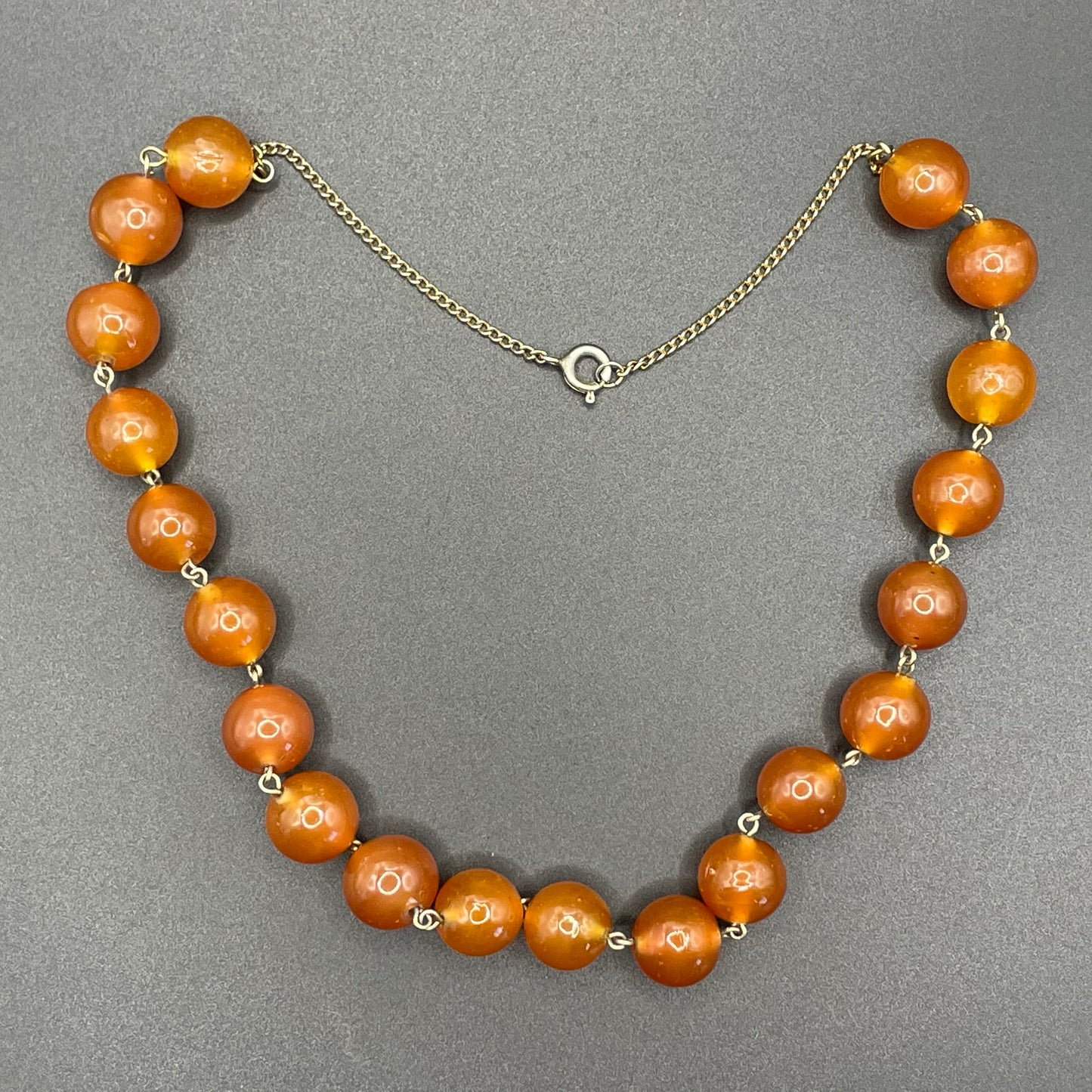 Vintage Art Deco uranium glass Carnelian coloured beaded necklace, lovely orange beads that glow yellow under UV light