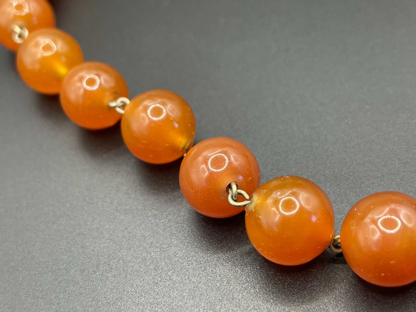 Vintage Art Deco uranium glass Carnelian coloured beaded necklace, lovely orange beads that glow yellow under UV light