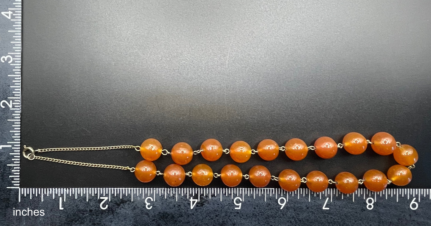 Vintage Art Deco uranium glass Carnelian coloured beaded necklace, lovely orange beads that glow yellow under UV light