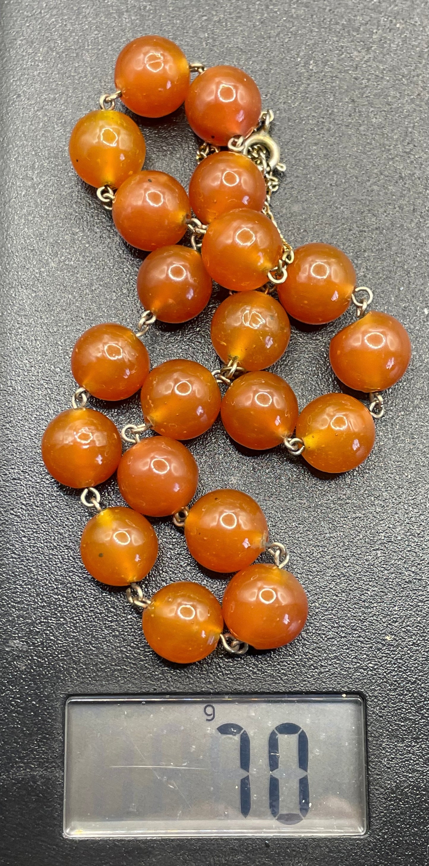 Vintage Art Deco uranium glass Carnelian coloured beaded necklace, lovely orange beads that glow yellow under UV light