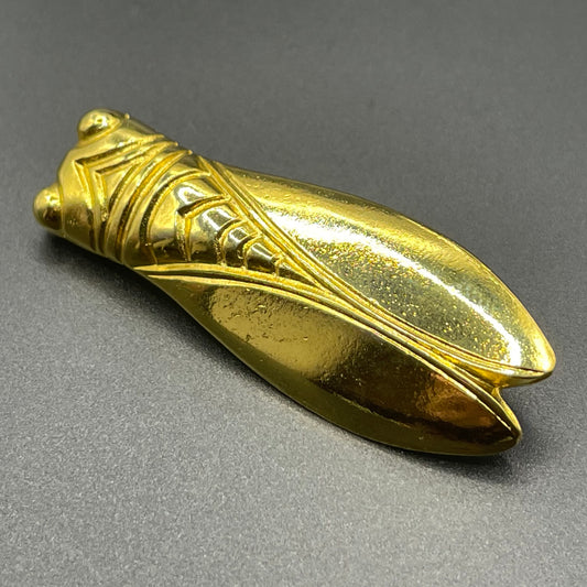 Vintage gold tone cicada brooch, signed Les Olivades, Egyptian revival