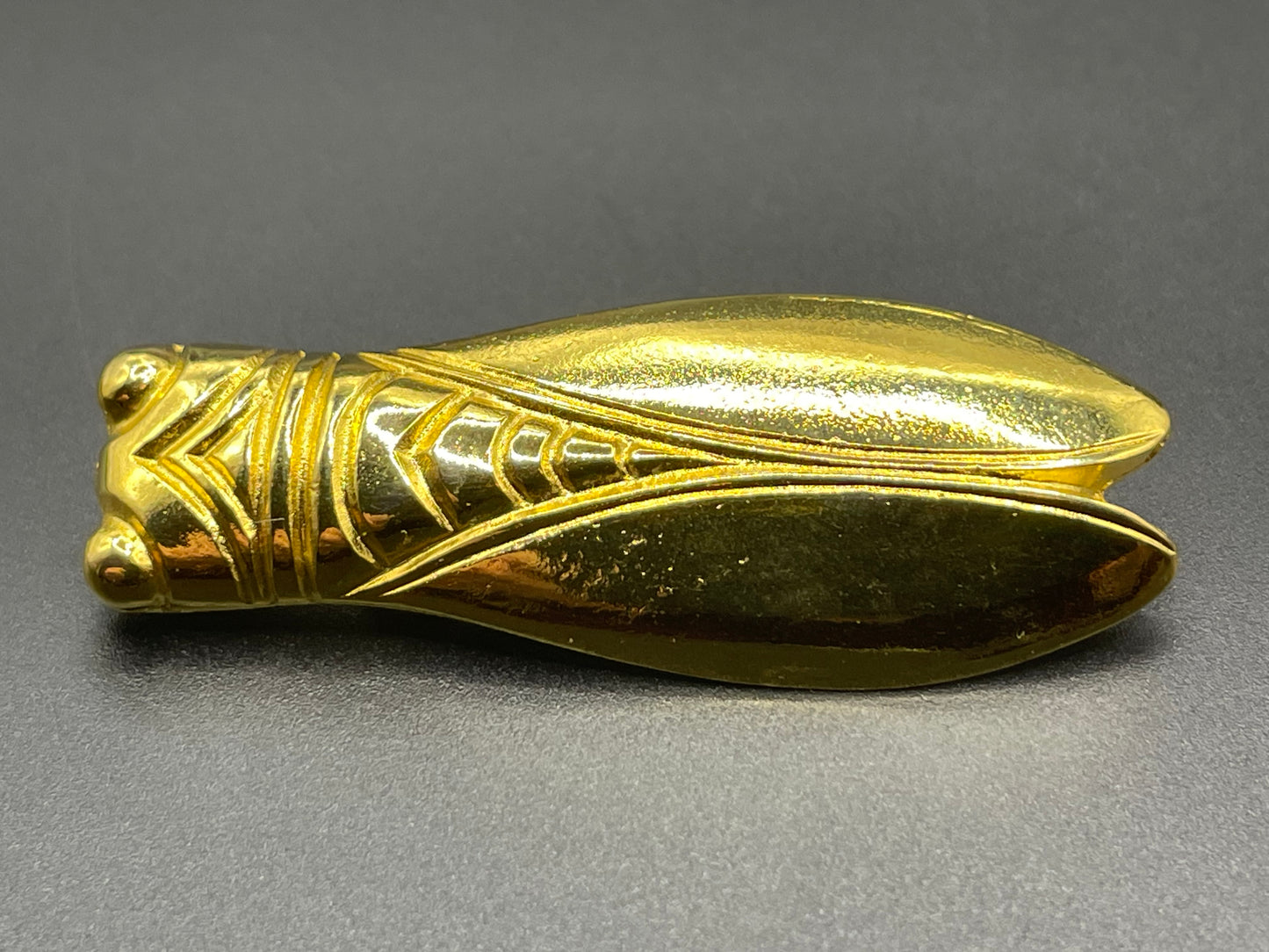 Vintage gold tone cicada brooch, signed Les Olivades, Egyptian revival