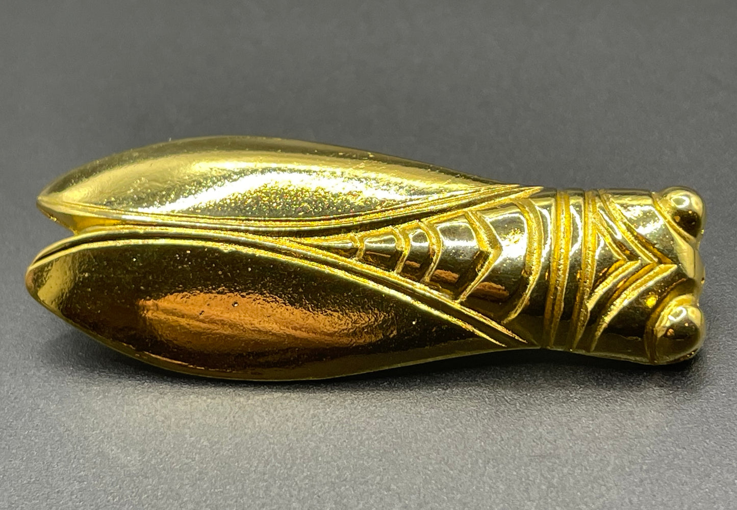 Vintage gold tone cicada brooch, signed Les Olivades, Egyptian revival