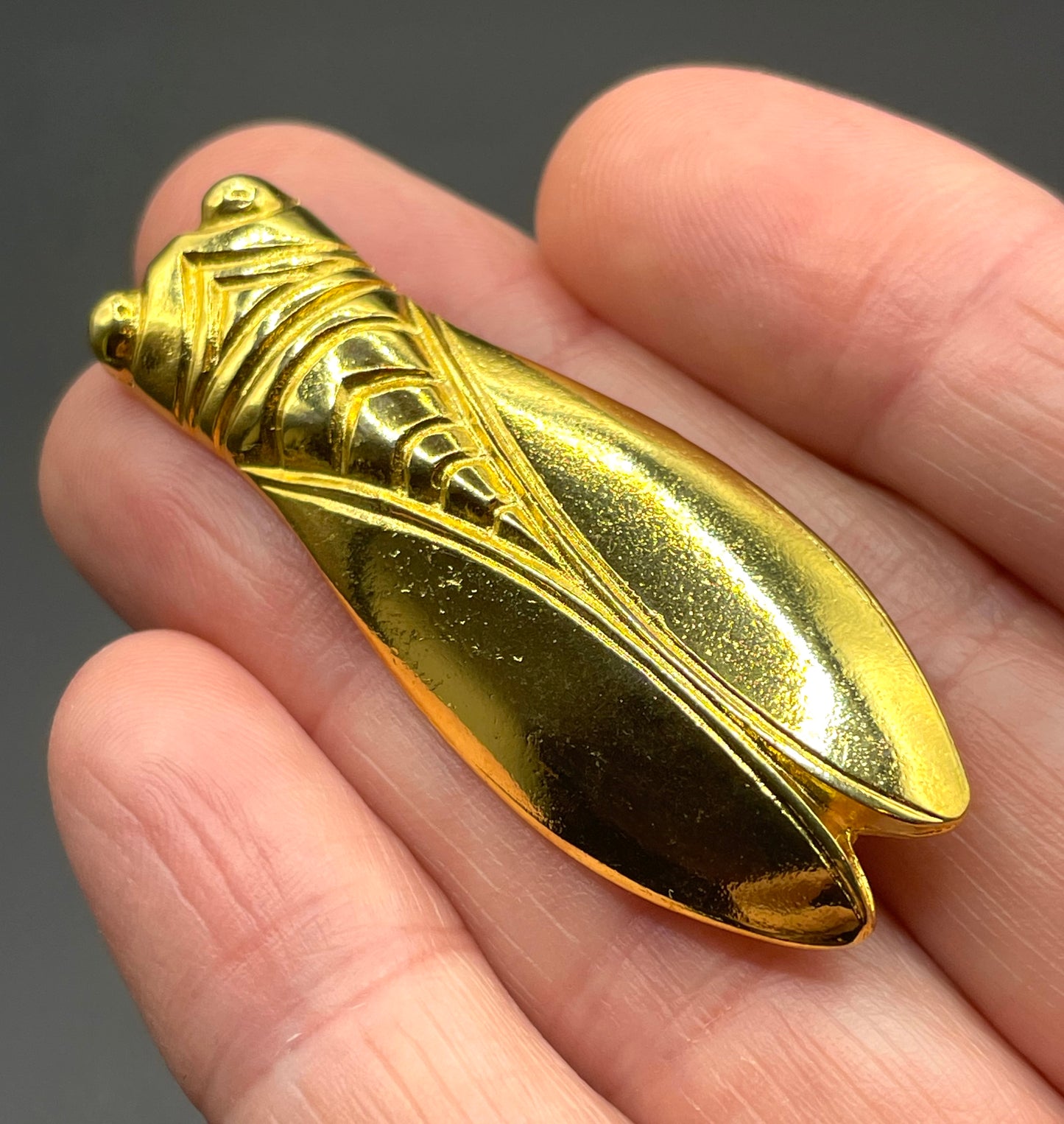 Vintage gold tone cicada brooch, signed Les Olivades, Egyptian revival