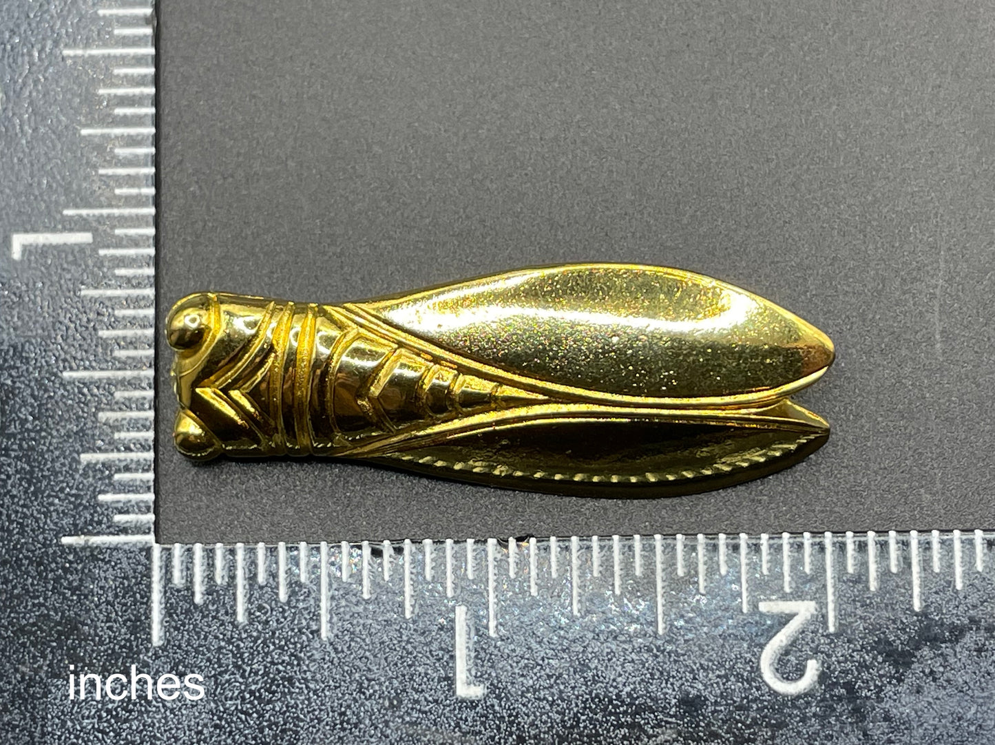 Vintage gold tone cicada brooch, signed Les Olivades, Egyptian revival