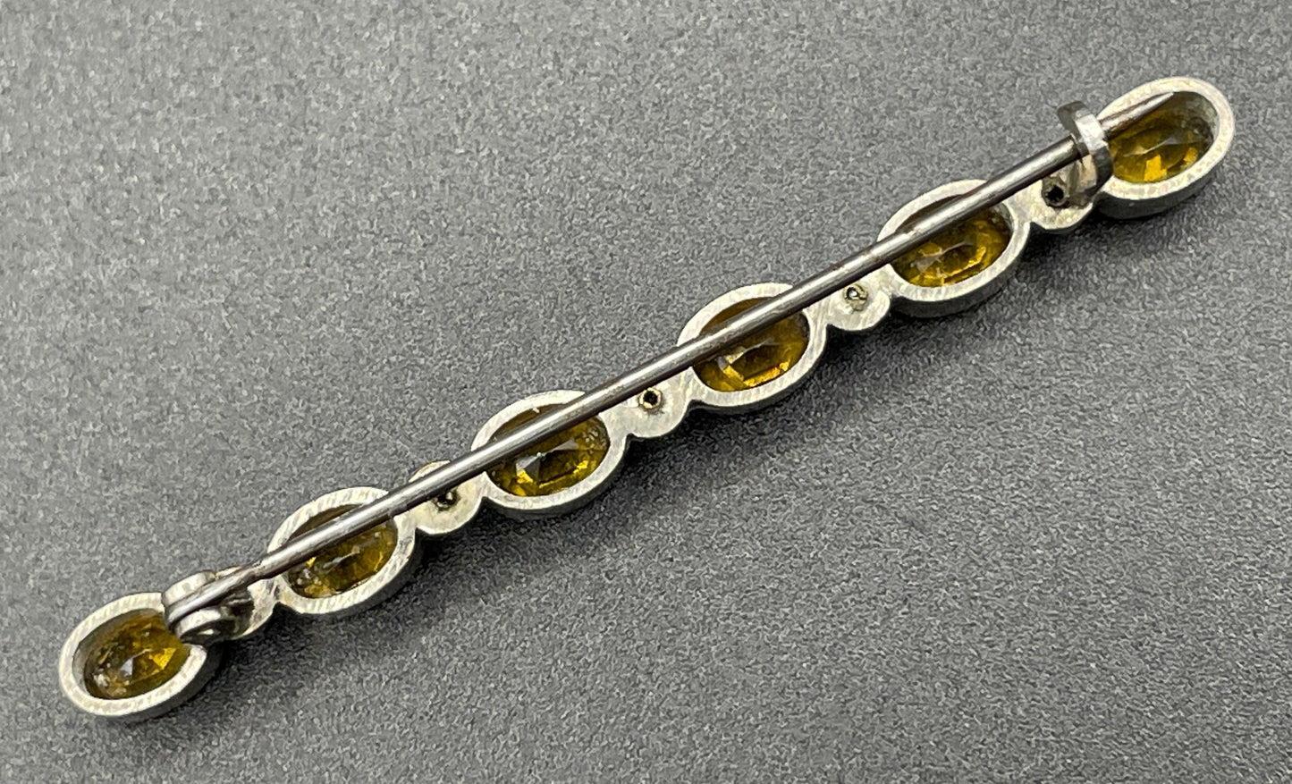 Vintage collet set citrine yellow and clear glass rhinestone shiny silver tone bar brooch pin