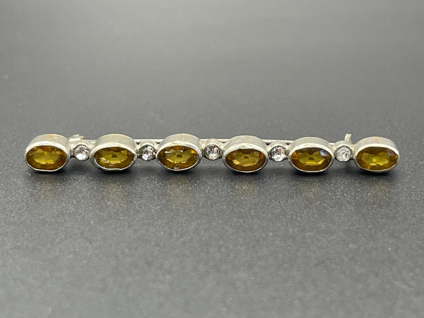 Vintage collet set citrine yellow and clear glass rhinestone shiny silver tone bar brooch pin