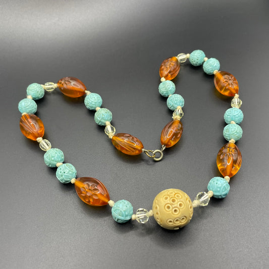 Vintage Art Deco moulded glass and carved cream galalith large bead necklace, pale blue, clear and citrine yellow / orange glass