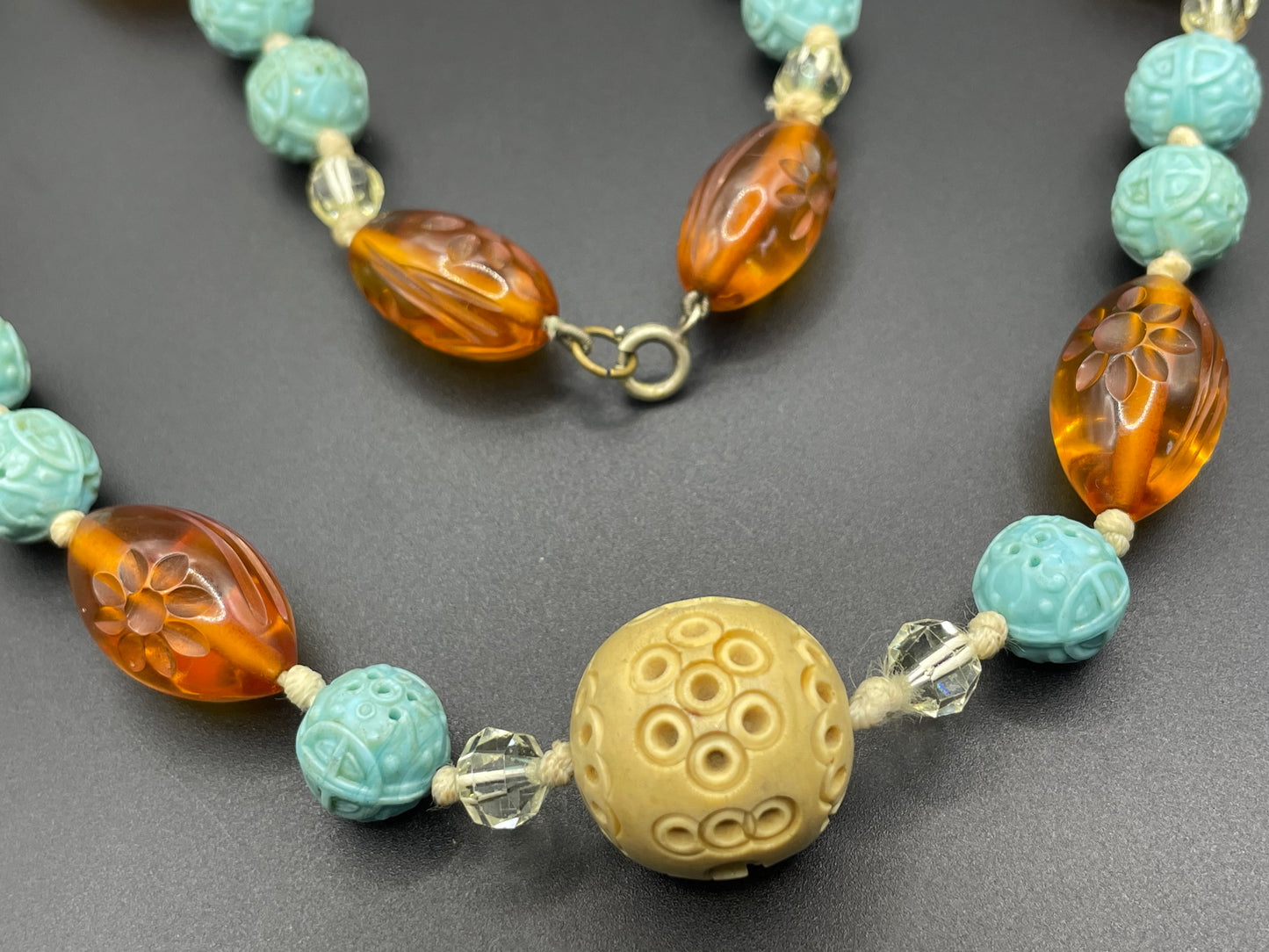 Vintage Art Deco moulded glass and carved cream galalith large bead necklace, pale blue, clear and citrine yellow / orange glass