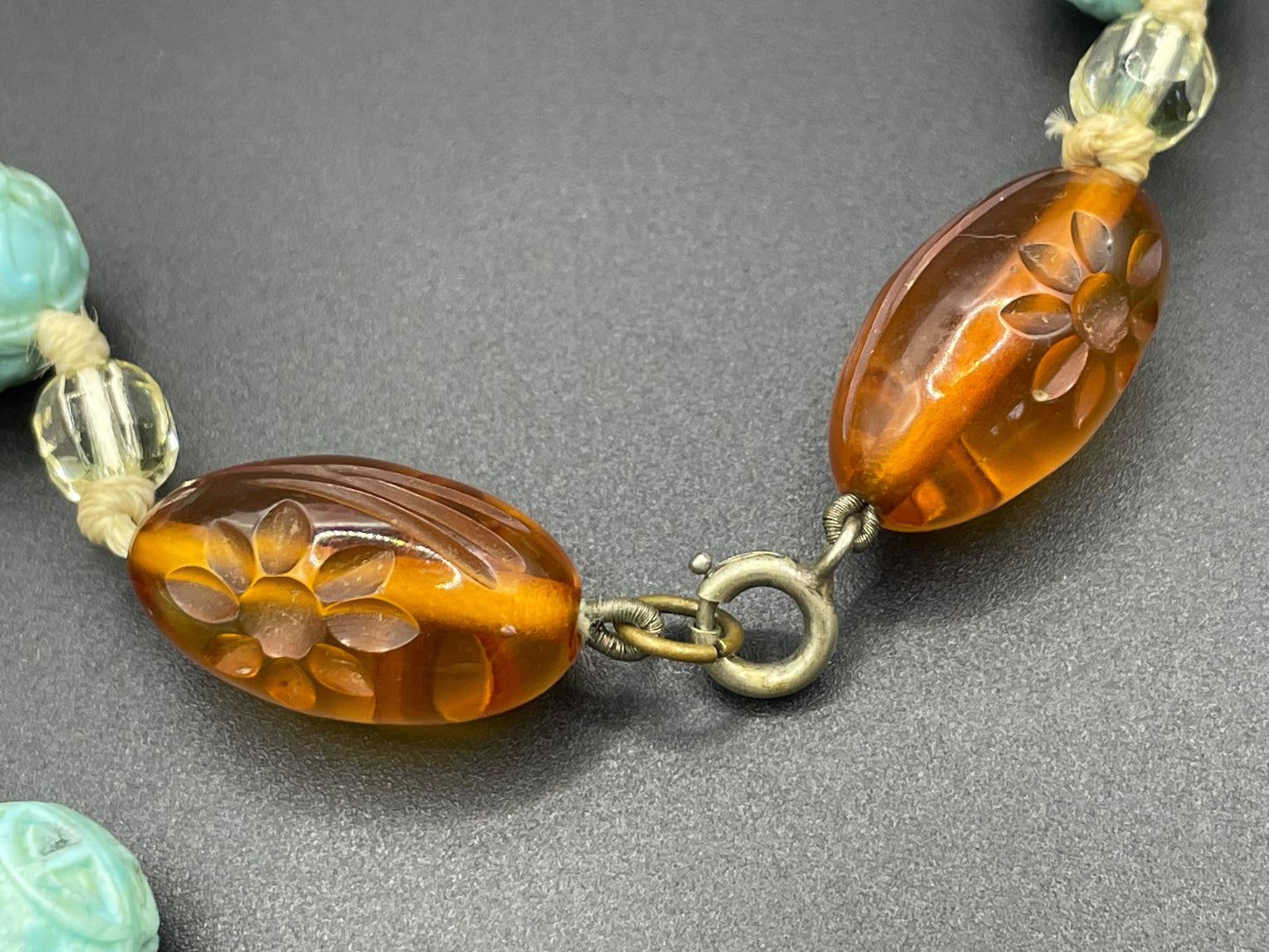 Vintage Art Deco moulded glass and carved cream galalith large bead necklace, pale blue, clear and citrine yellow / orange glass