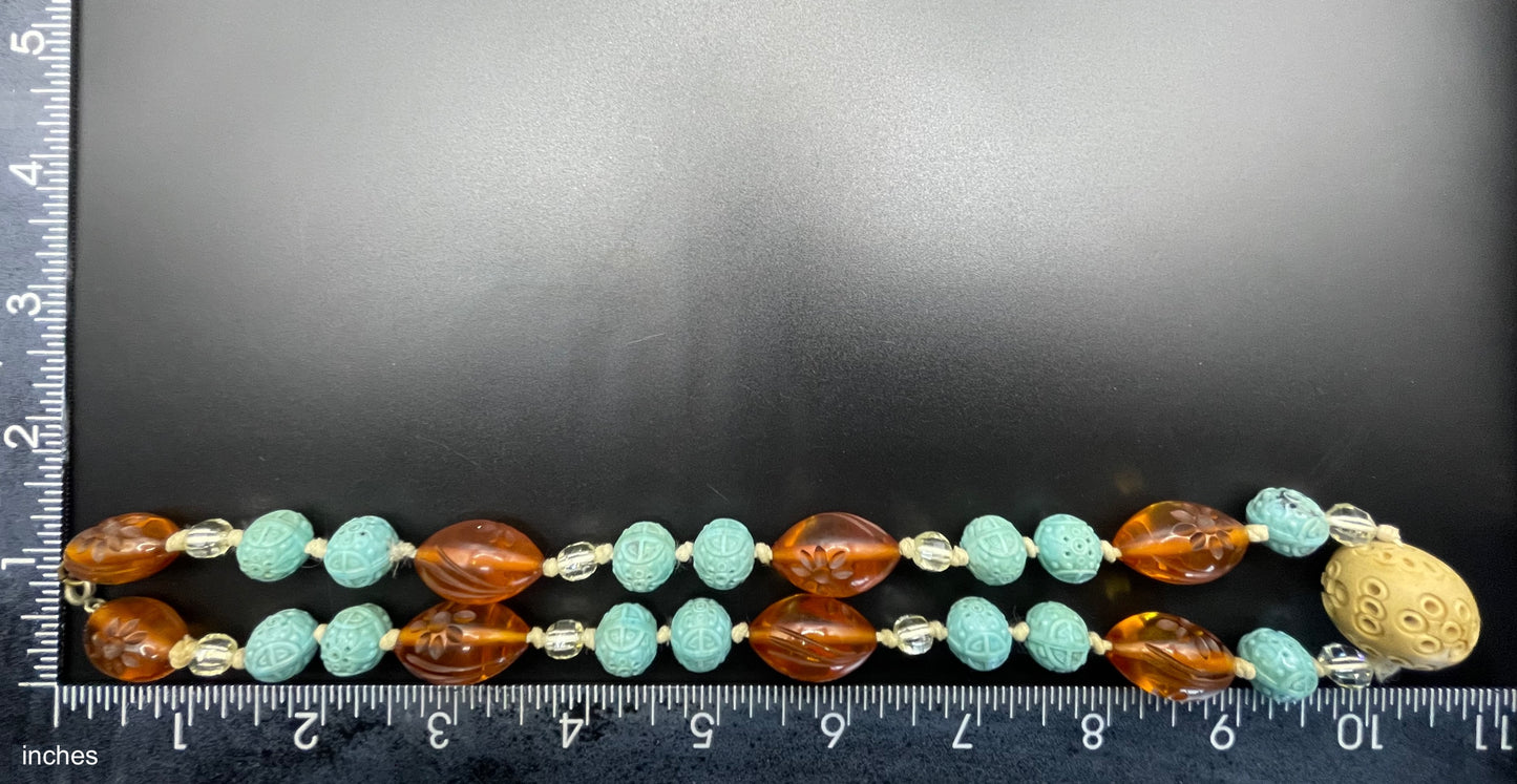 Vintage Art Deco moulded glass and carved cream galalith large bead necklace, pale blue, clear and citrine yellow / orange glass